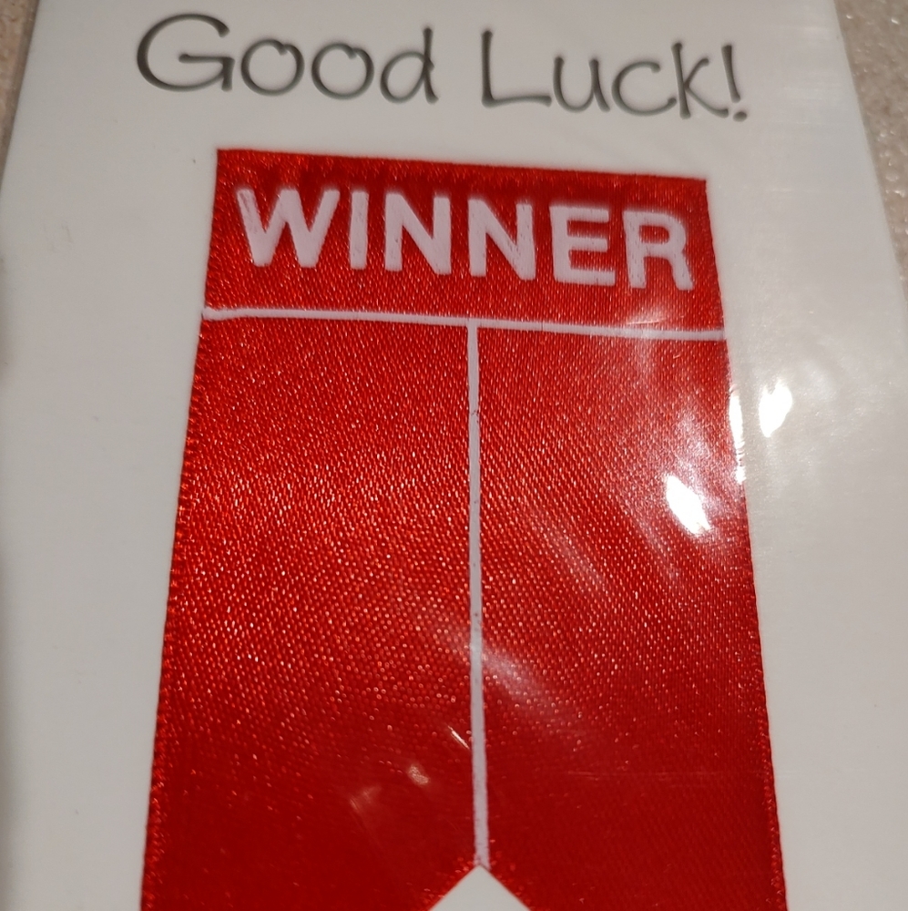 Celebrate victory. beautiful red winner ribbon. Special Olympics Athletes Oath